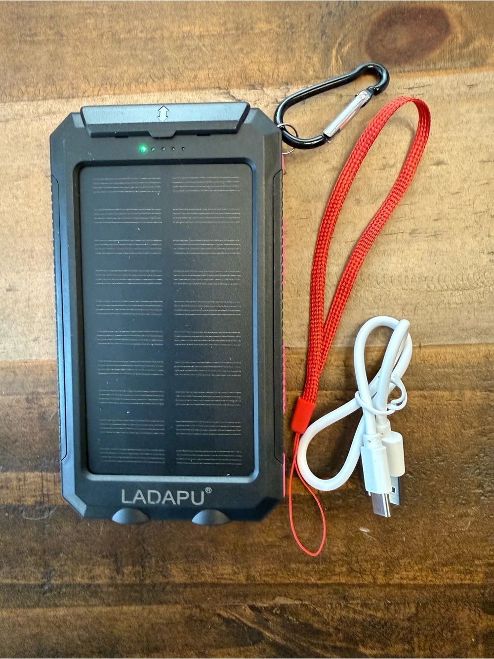 LADAPU Solar Power Bank with Red Wrist Strap